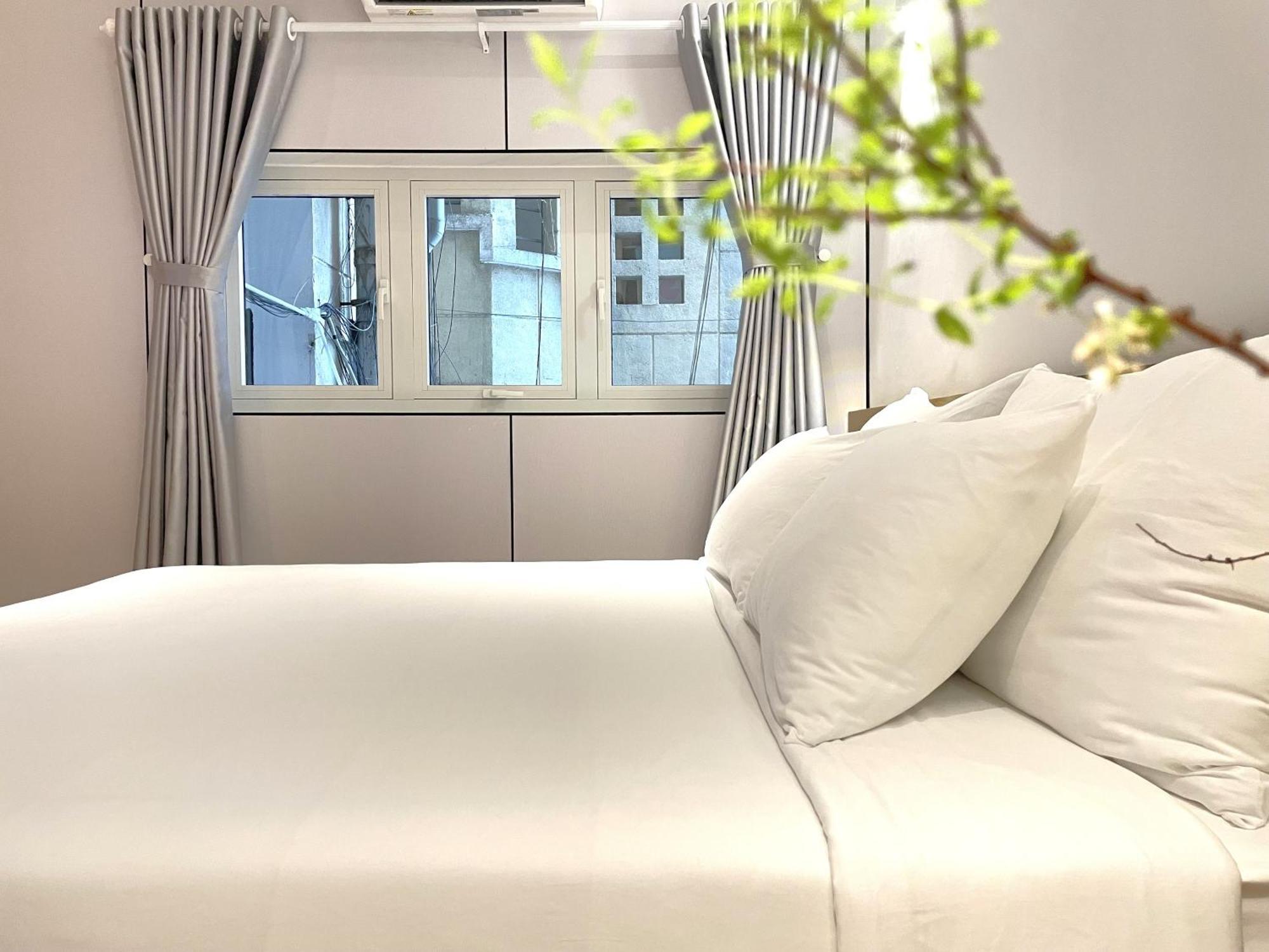 6Even Hotel - Have A Staycation In The Cafe Apartments Building ホーチミン市 エクステリア 写真